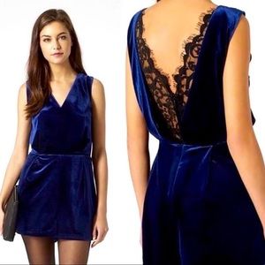 Blue velvet topshop romper with lacy exposed back. Size 4.